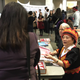 Janet Beihoffer, Minnesota’s RNC national committeewoman, and Maniela Vang recruit supporters in Saint Paul during Hmong New Year.